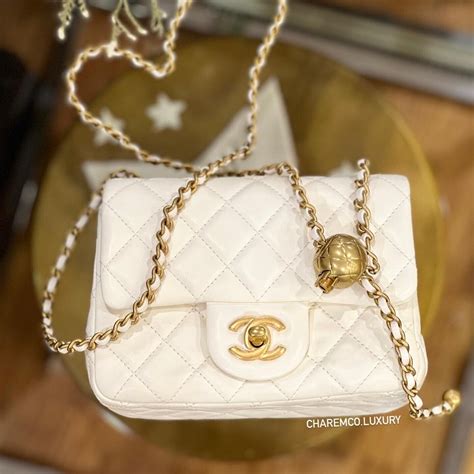 chanel mini white pearl bag|chanel bag with pearls strap.